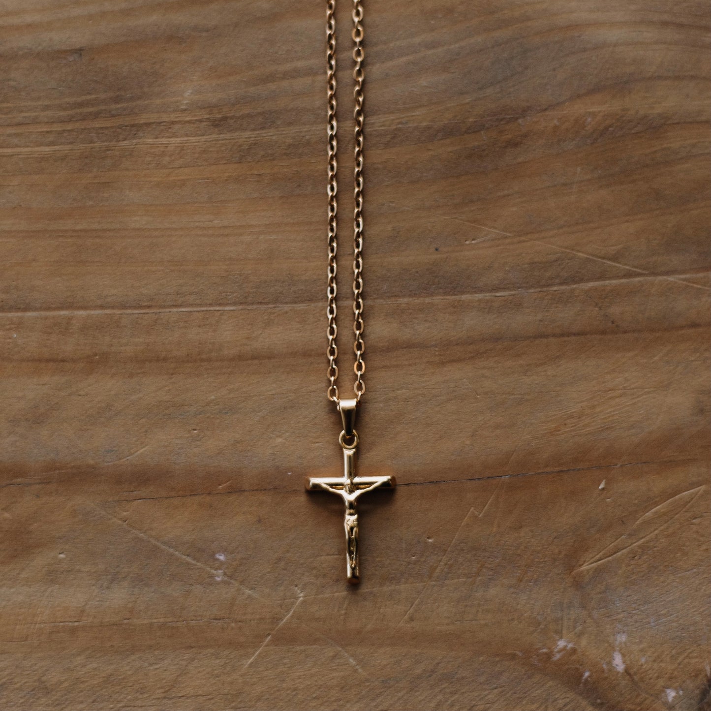 Gold crucifix necklace